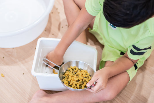 Play-based learning Bilingual kid playing at language center